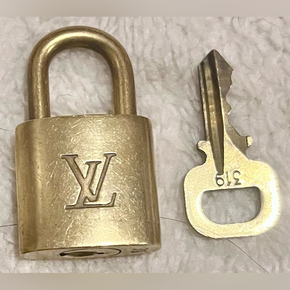 Louis Vuitton padlock and key